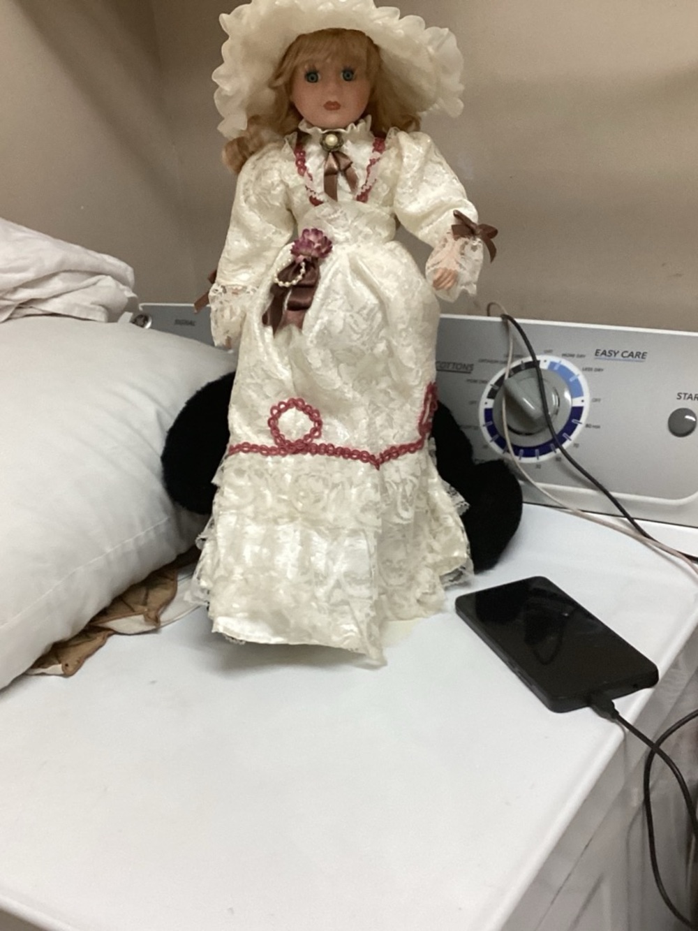 Collectible Porcelain Doll in Cream Dress with Pink Trim